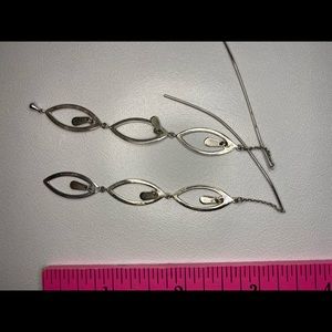 Silver Threaded Earrings with Oval Shapes